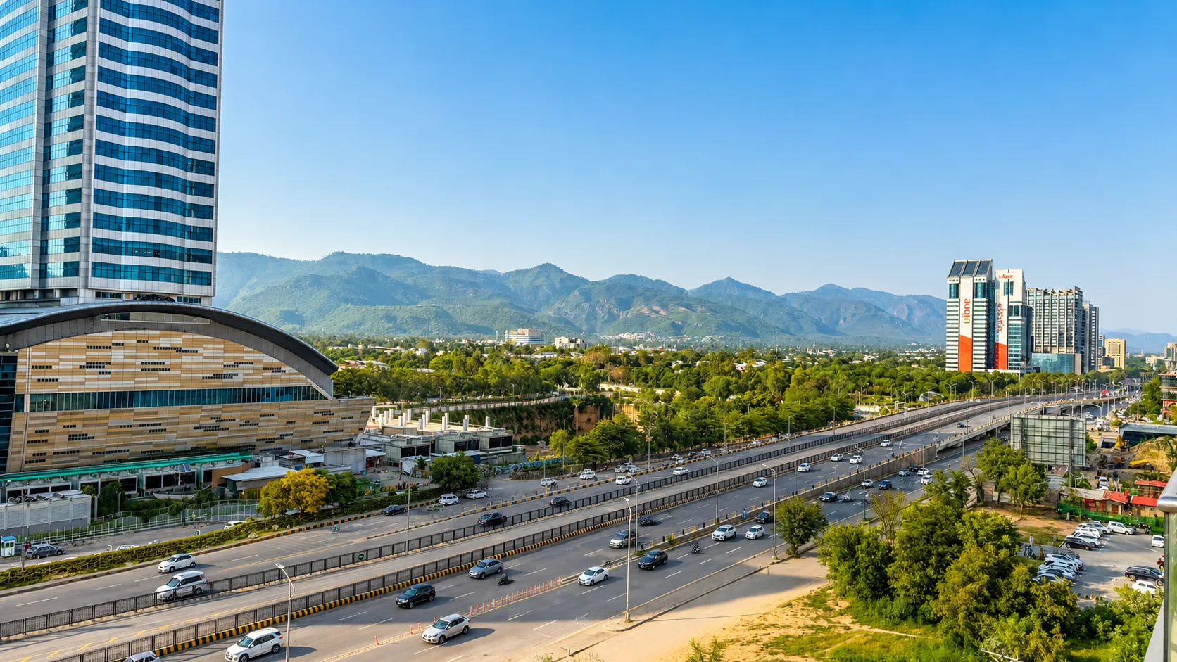 Aerial view of Blue Area Islamabad with Centaurus Mall, Margalla Hills, and Jinnah Avenue near Elysium Tower furnished apartments